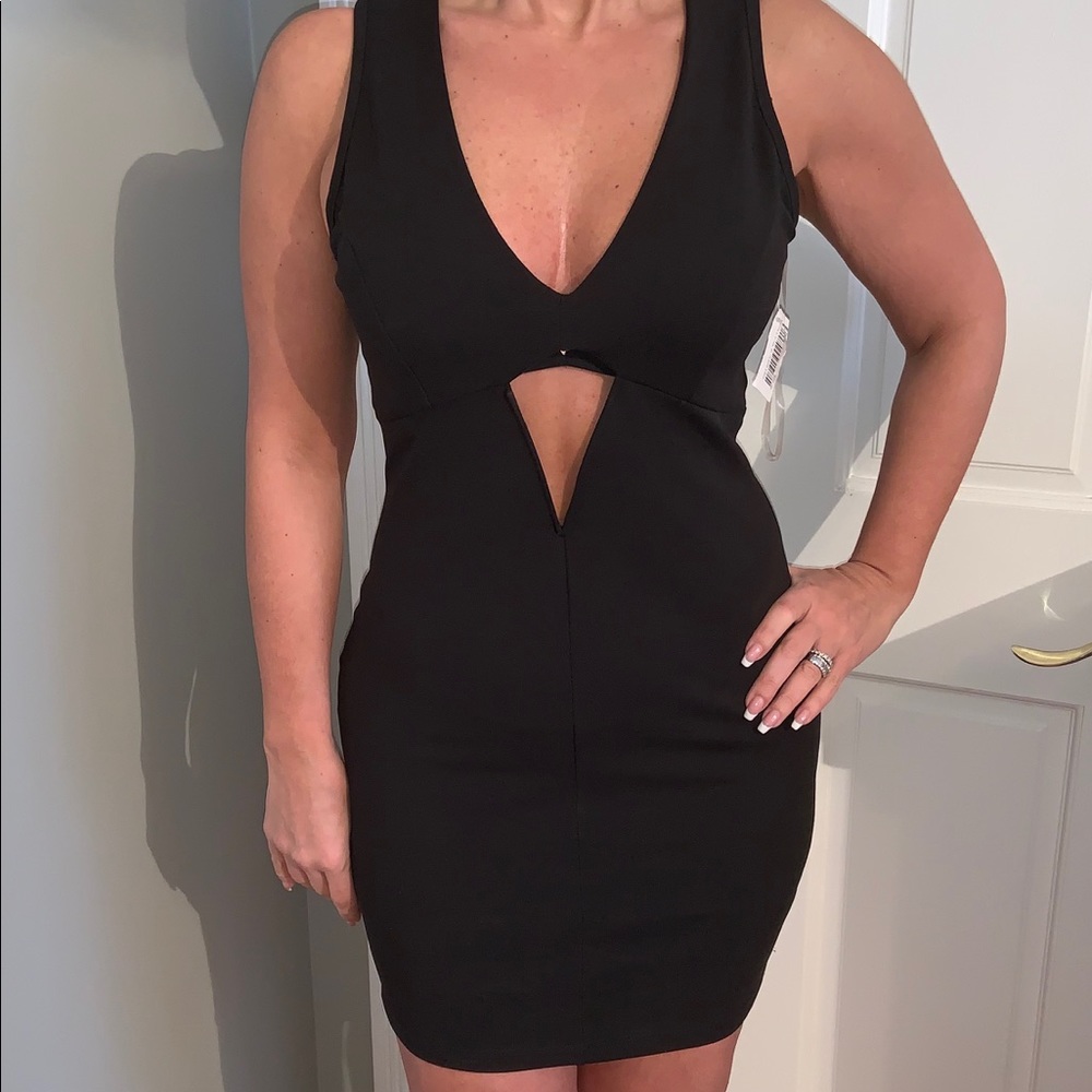 NWTS black mini dress with cut out size medium